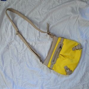 Crossbody yellow and tan purse by Charming Charlie.